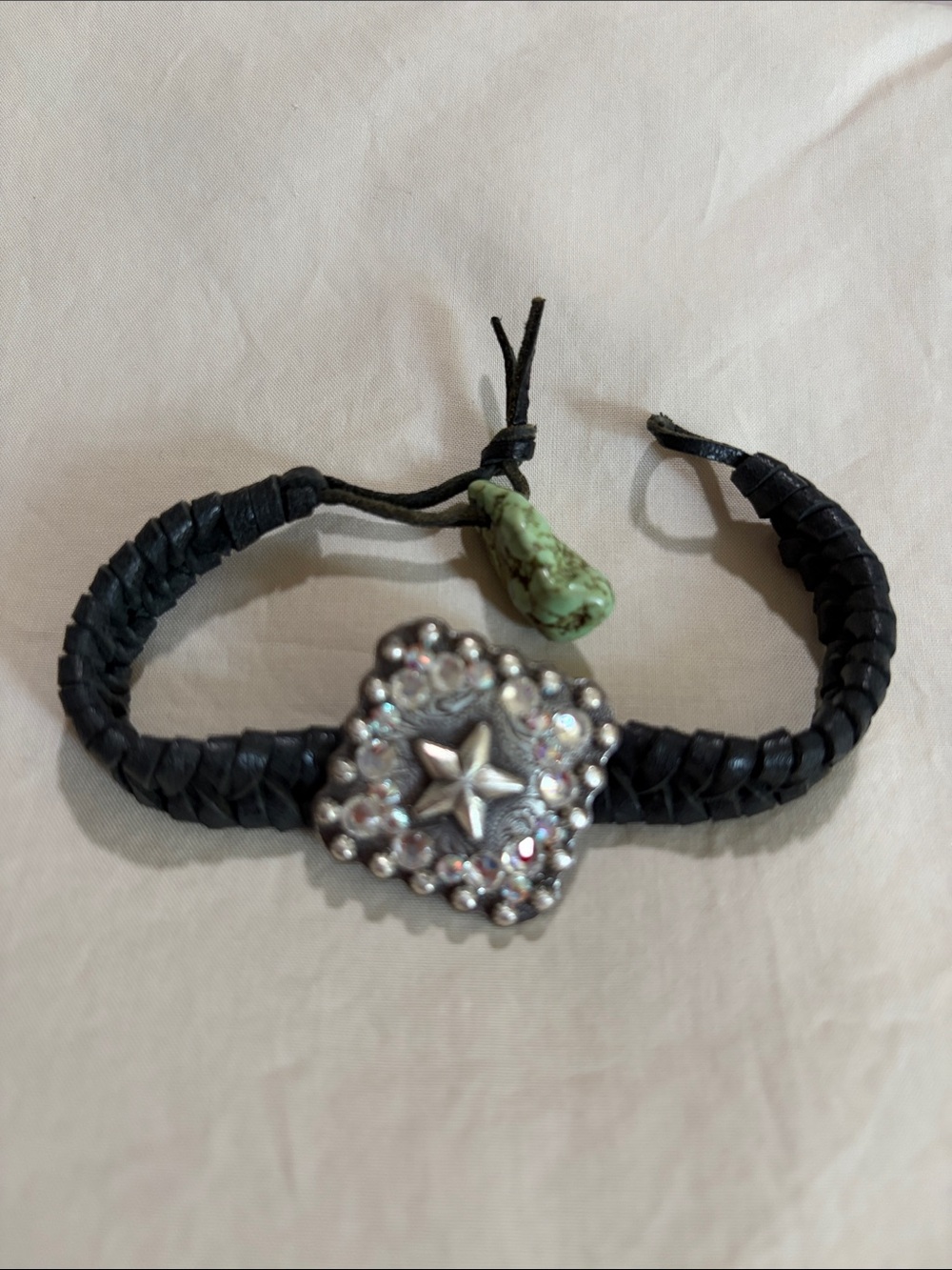 Handcrafted Black Braided Leather Bracelet with Star Concho and Turquoise Accent